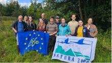 LIFE PeatPals project partners with flags at the Valley of the Abeek