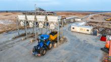 Tractor standing under a sediment container
